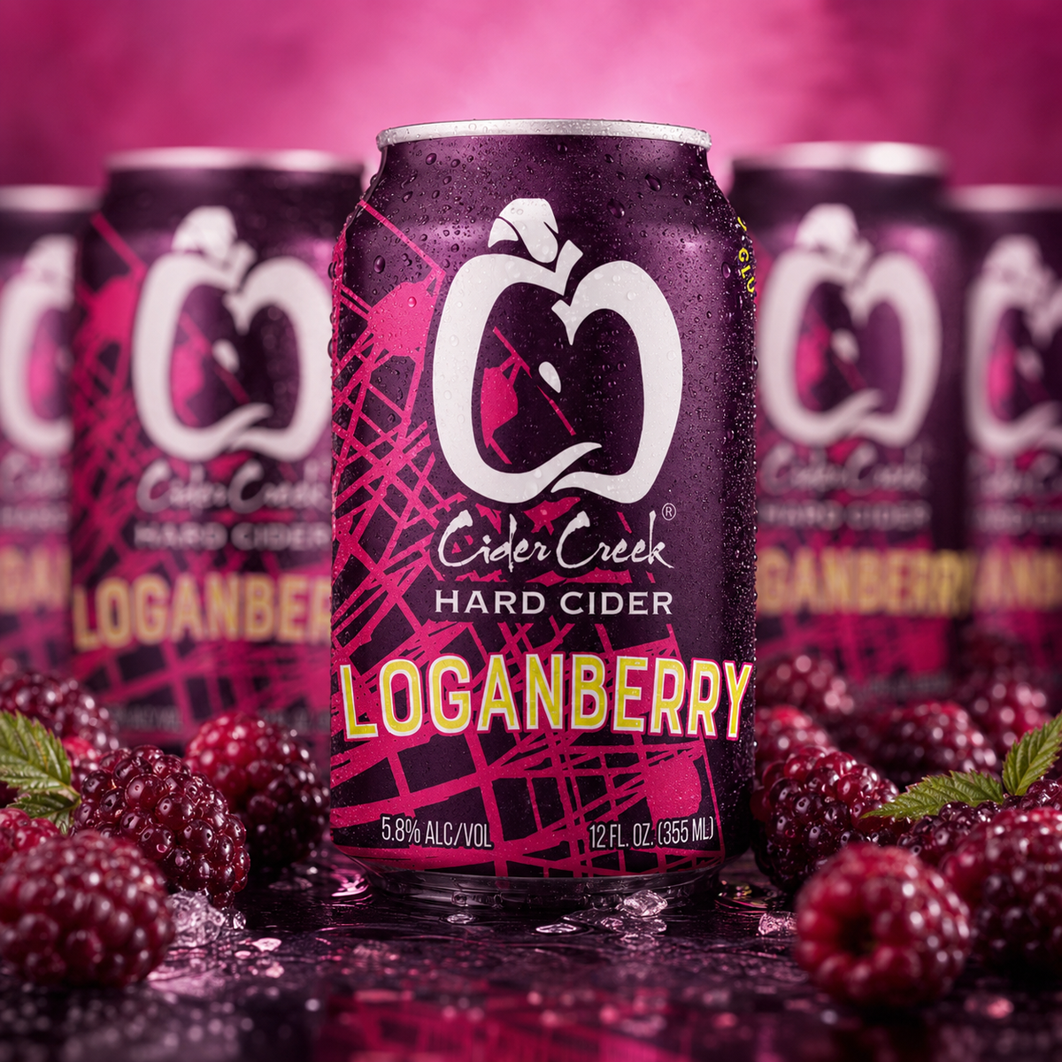 Loganberry hard cider cans with fresh berries against a vivid berry backdrop